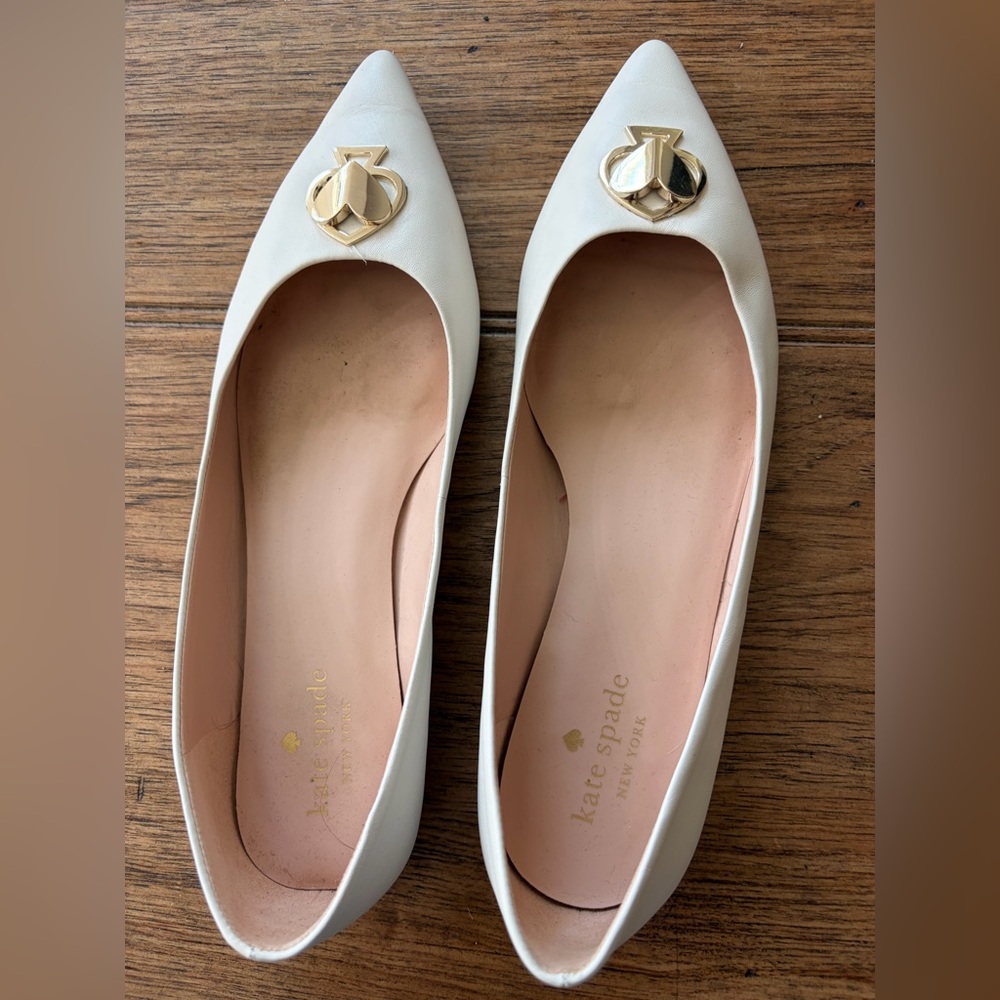 kate spade White Pointed Toe Flats with Gold and Silver  Logo Accent